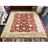 A Handmade Egyptian Rug. Red and Beige ground.