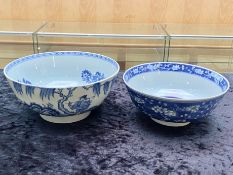 An Antique Chinese Blue & White Bowl, depicting a landscape and figures, the interior with blossom,