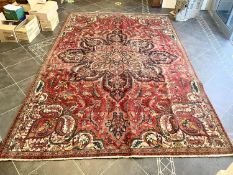 Vintage Red Ground Persian Heriz Rug from Iran. Measures approx 290 x 200 cm.
