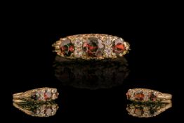 Antique Period - Attractive 9ct Gold Garnet and Diamond Set Ring, Gallery Setting.
