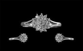 18ct White Gold Attractive Diamond Set Cluster Ring, flowerhead setting.