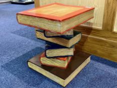 Wooden Side Table in the Form of a Pile of Books, with red and blue covers and gilt pages.