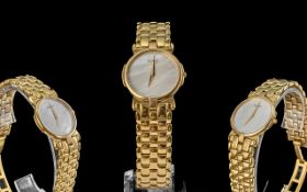 Gucci Ladies Gold Plated Wristwatch with Mother of Pearl Dial gold hands, deployment clasp.