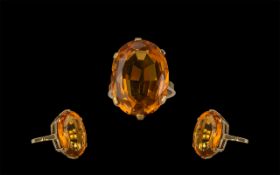 An Excellent 9ct Gold Orange Citrine Set Statement Ring the large faceted orange Citrine of