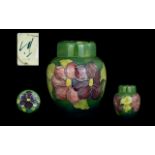 Moorcroft Modern Tube lined Lidded Ginger Jar ' Clematis ' Design on Green Ground.