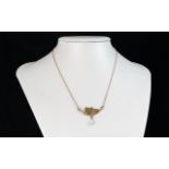 Ladies 9ct Gold Novelty Cat & Pearl Necklace/Drop. The central feature figure of cat with pearl on a