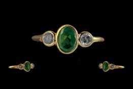 18ct Gold Attractive 3 Stone Emerald and Diamond Set Ring full hallmarks to interior of shank.