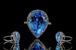 Ladies 9ct White Gold Attractive Blue Topaz and Diamond Set Ring.