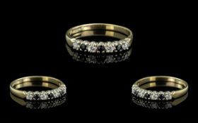 Ladies 9ct Gold Pleasing 7 Stone Diamond and Sapphire Set Ring. Full Hallmark to Shank.