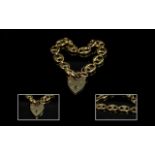 Ladies - Superb Quality 9ct Gold Bracelet with Large Heart Shaped Padlock.