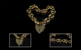 Ladies - Superb Quality 9ct Gold Bracelet with Large Heart Shaped Padlock.
