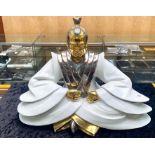 Oriental Porcelain Buddha, in white gloss with gilt finish. Decorative item, 18" tall x 22" wide.