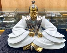 Oriental Porcelain Buddha, in white gloss with gilt finish. Decorative item, 18" tall x 22" wide.