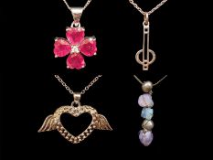 Four Silver Pendants, comprising a heart with wings suspended on a chain,