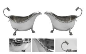 A Pair of Fine Quality Sterling Silver Gravy Boats with Serpents Handle and Feet, Celtic Borders.