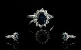 18ct White Gold - Attractive Diamond and Sapphire Set Cluster Ring. Marked 18ct to Shank.