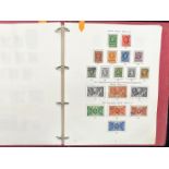 Stamp interest: Red Stanley Gibbons loose leaf illustrated GB stamp album - Partially filled with