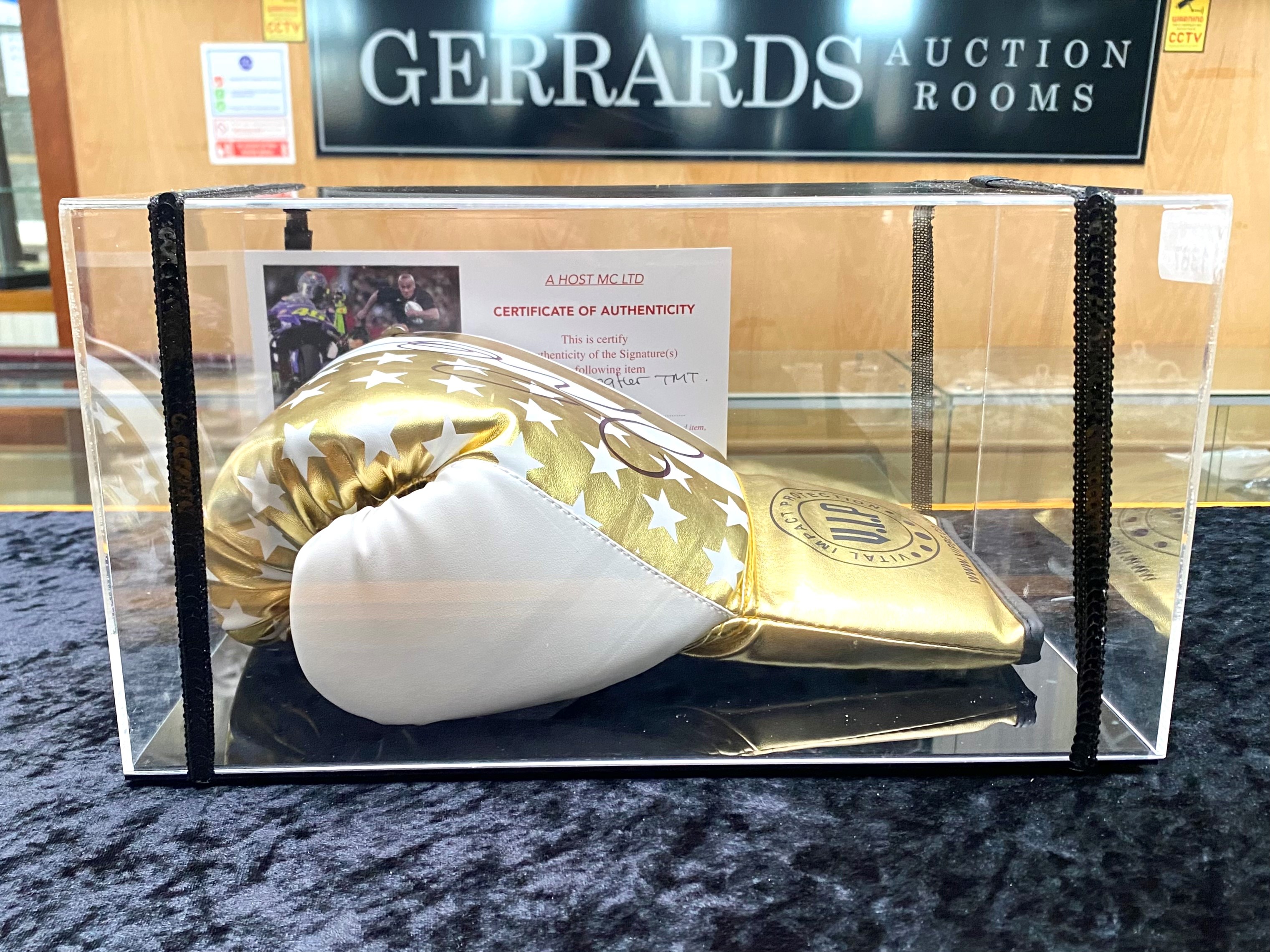 Boxing Interest Floyd Mayweather Signed VIP Glove with certificate of authenticity from A Host MC