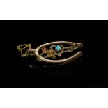 9ct Gold Wishbone Brooch, set with rubie