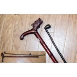 A Victorian Walking Cane, together with