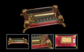 A Reuge Sainte Croix Music Box, from Switzerland, playing three tunes, in good working order.