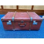 Large Vintage Suitcase, brown with strapping and studs. Measures 17'' wide x 28'' long x 11'' high.