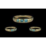 Ladies - Contemporary Designed 9ct Gold 3 Stone Aquamarine Set Ring.
