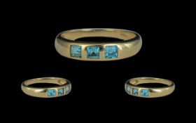 Ladies - Contemporary Designed 9ct Gold 3 Stone Aquamarine Set Ring.