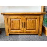Oak Sideboard, solid construction, two doors opening to reveal interior storage.