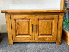 Oak Sideboard, solid construction, two doors opening to reveal interior storage.