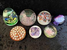 Collection of Seven Glass Paperweights, comprising a large Caithness Scotland 'Acrobat' No.