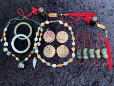 Box of Jade Items, including two bangles, two jade bead necklaces, one with a jade elephant figure,