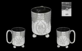 Elkington & Co. Superb Sterling Silver Cup Raised on Four Ball Feet with C shaped handle.