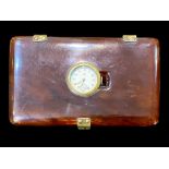 Art Deco Cigarette Case, Set With Clock in Bakelite, with brass mounts, measures 5" x 3".