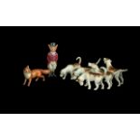 Beswick Hunting Figures comprising of a Fox and 5 hounds.
