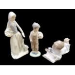 Three Nao Figures, comprising a boy with a football 8" tall,