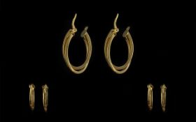 Pair of 9ct Gold Hoop Earrings By Goldsmiths Jewellers.