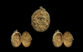 Middle Eastern Oriental Embossed Locket front and back depicting deities, yellow metal. 38 by 28 mm.