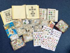 A Box Containing a Large Quantity of World Stamps, complete mix to sort, loose and in Albums,