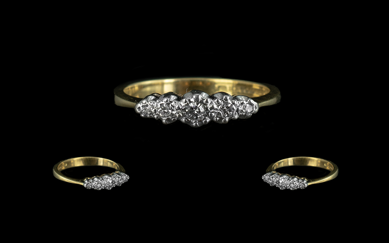 18ct Gold Diamond Ring set with five graduated round cut diamonds, illusion set, fully hallmarked.