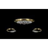 18ct Gold Diamond Ring set with five graduated round cut diamonds, illusion set, fully hallmarked.