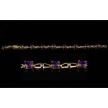 Ladies 18ct Gold - Attractive Amethyst and Diamond Set Bracelet. Marked 18ct.