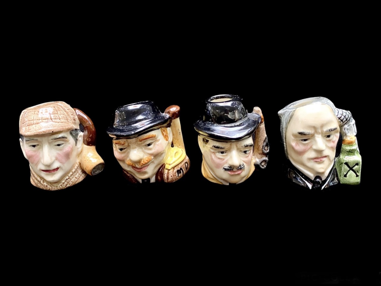 Aertone Miniature Sherlock Holmes Collection Toby Jugs, comprising a set of four Holmes, Watson,