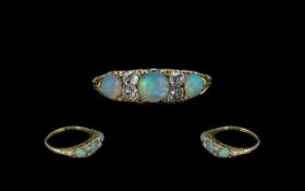 Antique Period Attractive 18ct Gold Opal and Diamond Set Ring with gallery setting and hallmarked