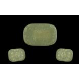 Chinese Jade Amulet of oval disc form, engraved decoration. Measures 3" x 2".