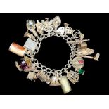 Chunky Silver Charm Bracelet, Loaded with Different Charms, Which Includes Telephone, lamp, shoe,