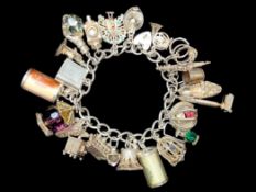 Chunky Silver Charm Bracelet, Loaded with Different Charms, Which Includes Telephone, lamp, shoe,