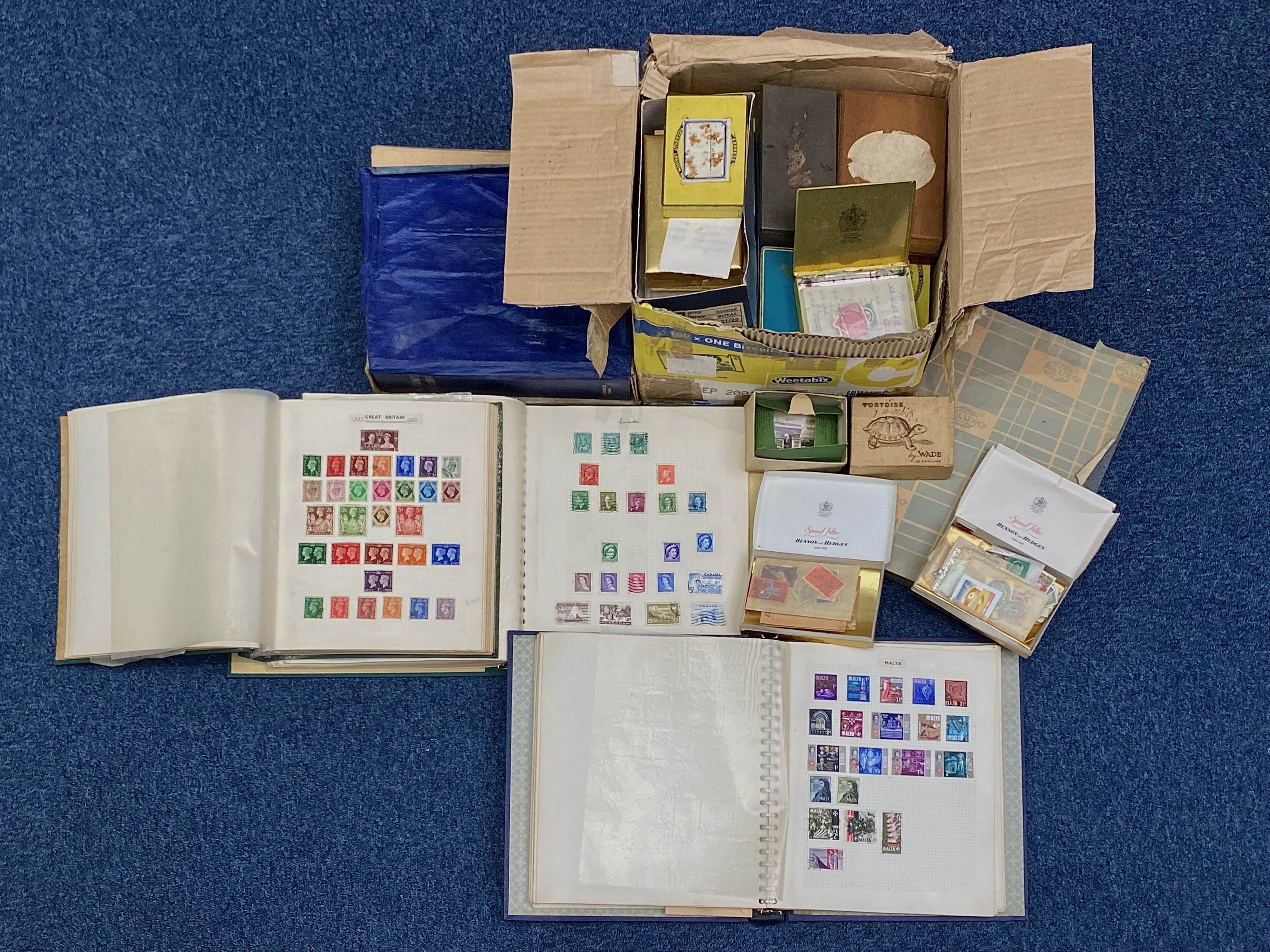 A Banana Box Containing a Large Quantity of Stamp Ephemera, world collection in 3 old albums, old