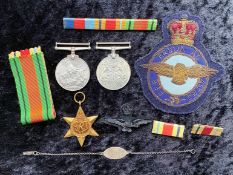 WWII Interest - Box containing 3 WWII medals, together with bar, RAF pin badge, cloth badge,