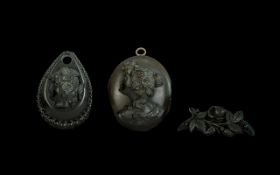 Antique Jet Cameo Locket profile of a lady 45 by 40 mm.